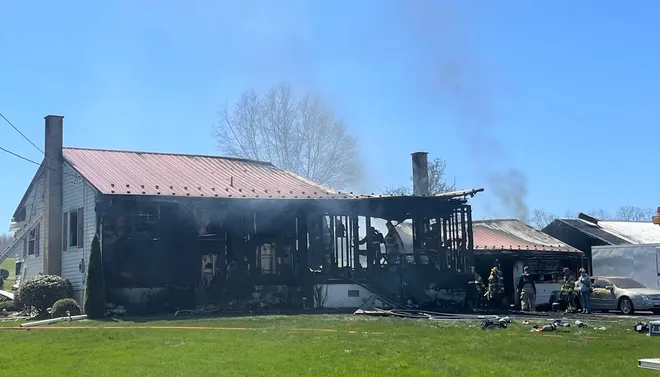 A home and garage were destroyed by fire